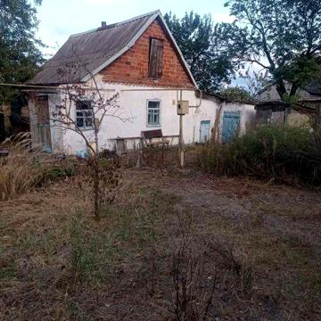Продаю 1/2 будинку з великою територією, с.Курилівка