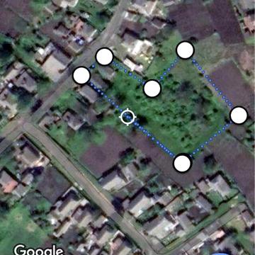 Земельна ділянка з будинком та гаражем