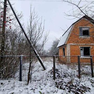 Будинок з земельною ділянкою в садовому товаристві (дача)