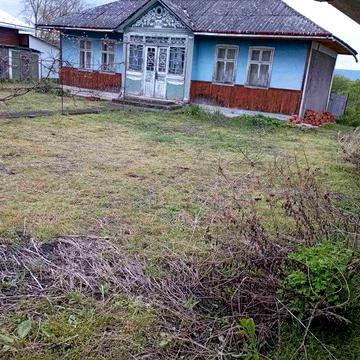 Продам дім земля с.Митків.