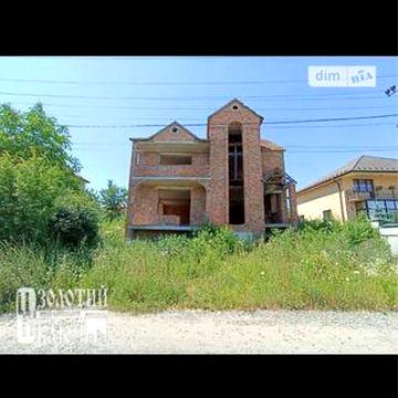 Будинок за Дамбою