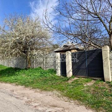 Продам земельный участок с домом и гаражом на Джанкойской 51