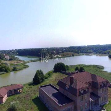Продажа дома  1000м2 с выходом на воду 1 ГА Петрушки