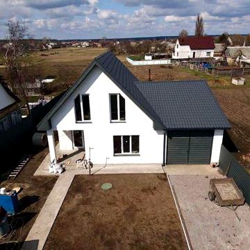 Сучасний новий будинок 150м2 з гаражем під 2 автомобіля біля лісу