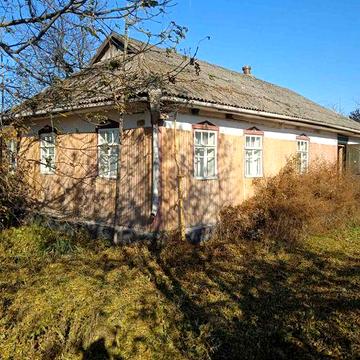 Продам землю з будинком  у с.Пиків