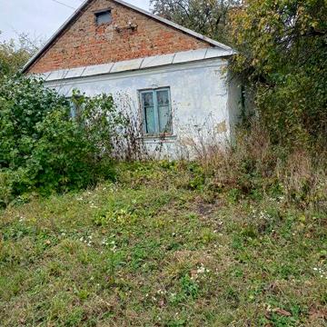 Земельна ділянка з будинком