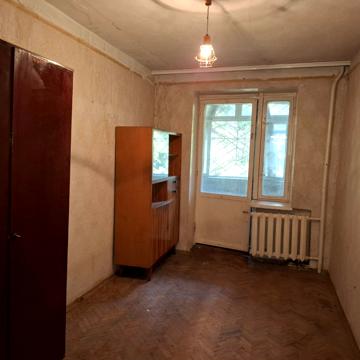 Євгена Коновальця вул. (Щорса), 15 