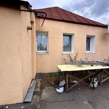 Будинок квартирного типу з землею
