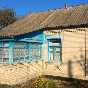 будинок з ділянкою Чуднів