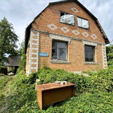 Дім. Київська обл., Миронівський р., с. Маслівка,