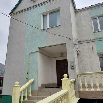 Будинок, гараж, земельна ділянка 10 соток