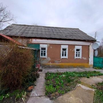 Будинок з новим парканом, ванною кімнатою та великою ділянкою  Вороніж
