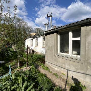 Продам  третю частину будинку в центрі міста