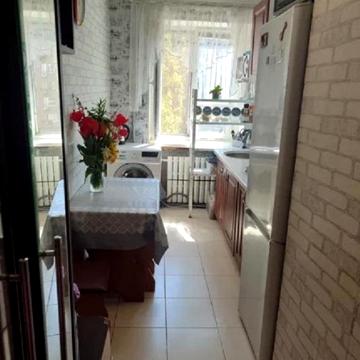 Жоліо Кюрі вул., 20