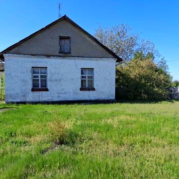 Продам будинок /4-х кімнатну квартиру