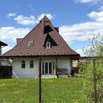 Продам будинок з вихідом на озеро та гаражем