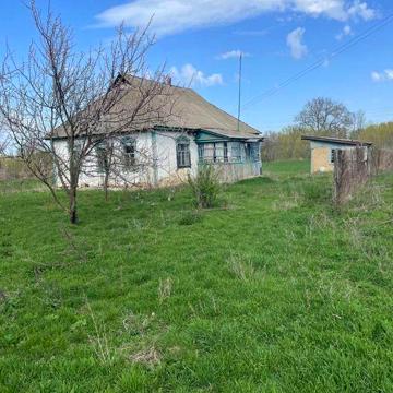 Продам теплий будинок із грубою