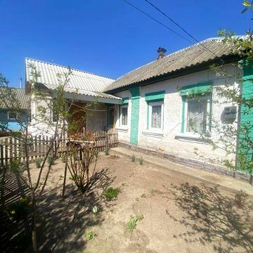 Продам будинок з літньою кухнею та гаражем