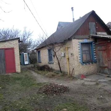 1/2 будинку з ділянкою в Горенці