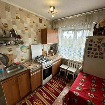 Партизанська вул., 51