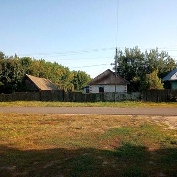 Будинок + земельна ділянка 25 соток