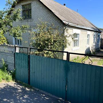 Будинок (частина) з участком та городом