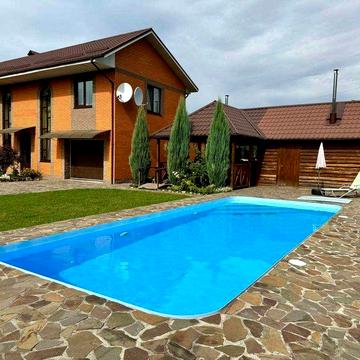 Продається будинок з басейном, укриттям та тепловим насосом!