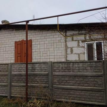 Продам 1/2 будинку в центрі міста вул.Богушевича