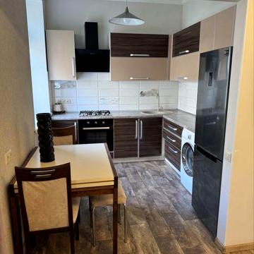 Сдается 1-комн. кв. в центре с паркоместом