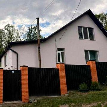 Продам новый дом с капитальным ремонтом в Мерефе