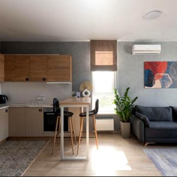 Duluxe Apartment с двуспальной кроватью и диваном