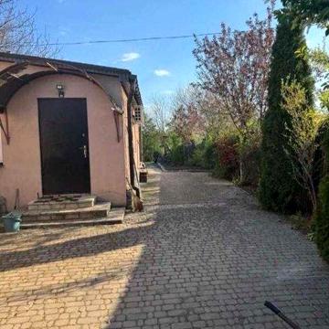 Продам в Дергачах цегляний будинок