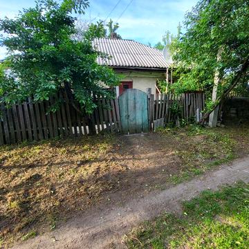 Продам домік врімянку в центрі міста.