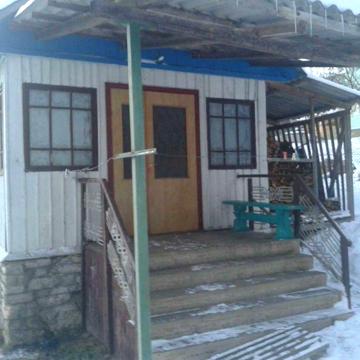 Продається деревяний будинок центр