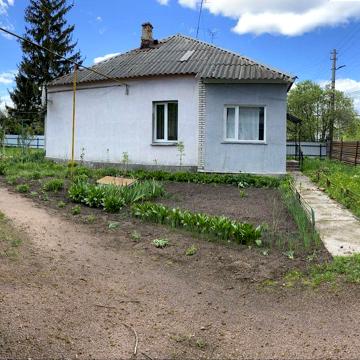 Продам 1/2частину будинку в Коростені