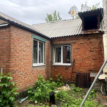 Продам будинок з земел. ділянкою, сарями по в. Кооперативній
