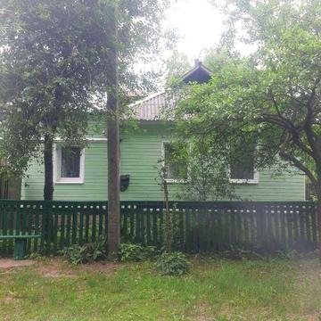 "Затишний будинок 60 м² з індивідуальним опаленням і невеликим гаражем