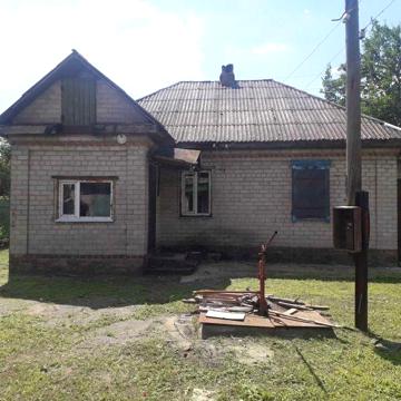 Цегляний будинок в центрі Раківки