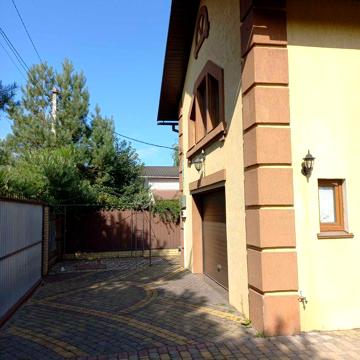 Продам сучасний будинок з гаражем і ділянкою біля лісу, Путрівка
