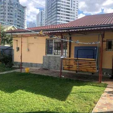 Квартира на земле с хорошим участком-альтернатива дому в черте города