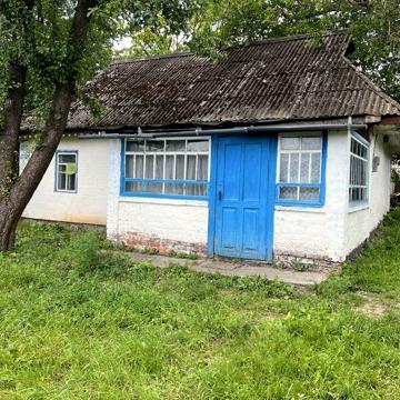 Будинок з приватизованою земельною ділянкою