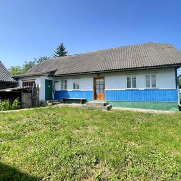 Будинок з приватизованою земельною ділянкою 0.25Га під будівницво.
