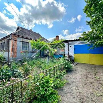 Продаж будинку з гаражем в Металургійному районі