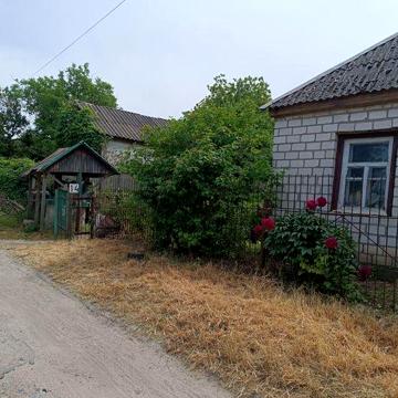 Ділянка з будинком