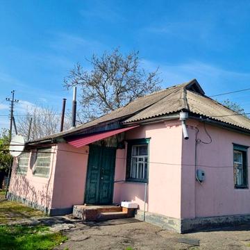 Будинок та приватизовано ділянка  землі