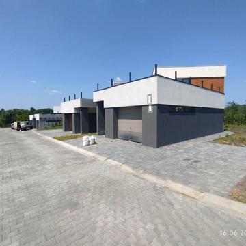 Дворівневі таунхауси 160м² + подарунок 55м² (підвал). Гараж.