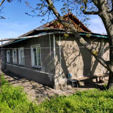 Продается половина жилого дома с участком  в Хлебодарское