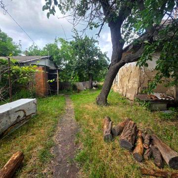 Продам земельну ділянку з будинком