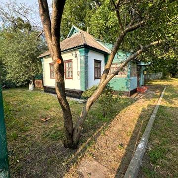 Будинок біля центру з ділянкою 8 соток