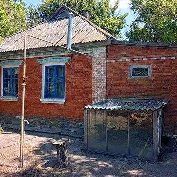 Будинок біля річки Сула в с. Мацківці